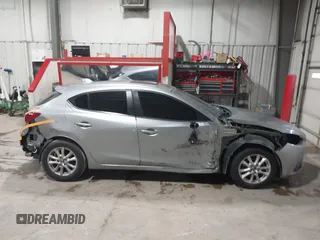 2015 Mazda 3 i Touring with VIN 3MZBM1L73FM214740, listed as a IAAI auction lot 41402534 with 83,436 mi miles and . Bid and sale history available at carsss.com. Image 14.