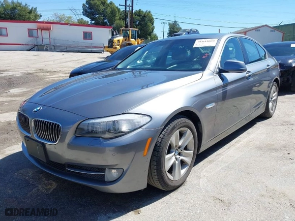 2012 BMW 5 Series 528i with VIN WBAXG5C53CDX03133, listed as a IAAI auction lot 41643009 with 105,360 mi miles. Bid and sale history available at carsss.com. Image 2.