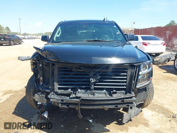 2020 Chevrolet Tahoe LT with VIN 1GNSKBKC7LR159742, listed as a IAAI auction lot 41854694 with 112,087 mi miles and . Bid and sale history available at DreamBid. Image 6.