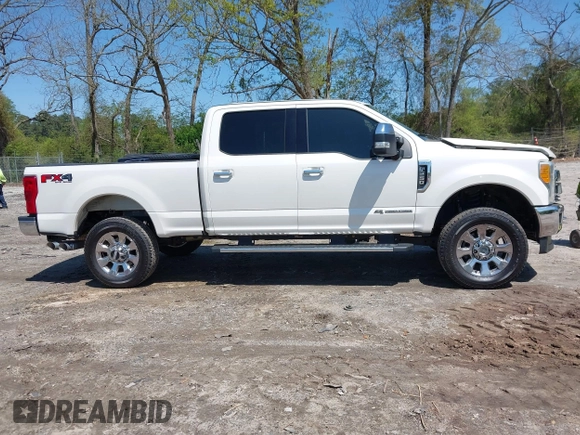 2017 Ford F-250 Lariat z VIN 1FT7W2BT4HEB67122, wystawiony jako IAAI lot #41992637 z przebiegiem 148 187 mil mil oraz . Historia ofert i sprzedaży dostępna na DreamBid. Obrazek 13.