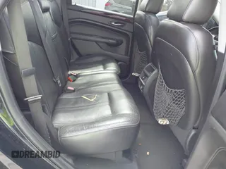 2013 Cadillac SRX Performance Collection z VIN 3GYFNDE39DS543037, wystawiony jako IAAI lot #42162276 z przebiegiem 156 282 mil mil oraz . Historia ofert i sprzedaży dostępna na DreamBid. Obrazek 8.