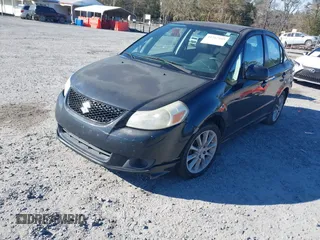 2008 Suzuki SX4 Convenience Pkg with VIN JS2YC415785101570, listed as a IAAI auction lot 41267109 with 214,841 mi miles. Bid and sale history available at carsss.com. Image 2.
