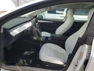 2023 Tesla Model 3 z VIN 5YJ3E1EA5PF580945, wystawiony jako Copart lot #58139125 z przebiegiem 19 057 mil mil oraz Szkoda całkowita • Salvage title. Historia ofert i sprzedaży dostępna na DreamBid. Obrazek 7.