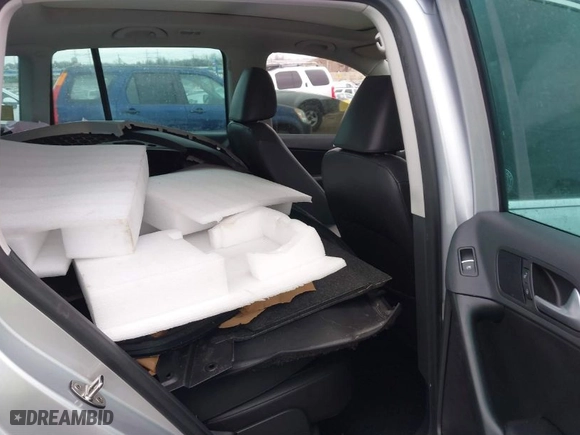 2017 Volkswagen Tiguan Wolfsburg Edition with VIN WVGSV7AX8HK031345, listed as a IAAI auction lot 41348567 with 130,313 mi miles. Bid and sale history available at carsss.com. Image 8.