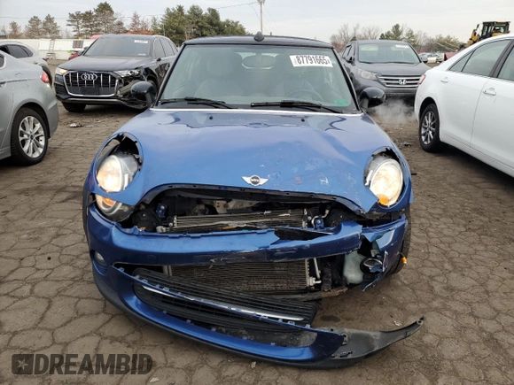 2014 MINI Convertible with VIN WMWZN3C53ET861225, listed as a Copart auction lot 87791665 with 104,151 mi miles and Salvage title. Bid and sale history available at DreamBid. Image 5.