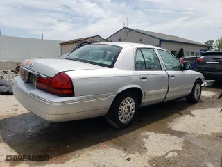 2003 Mercury Grand Marquis GS Convenience with VIN 2MEFM74W13X671414, listed as a Copart auction lot 63143394 with 129,629 mi miles and Non Repairable. Bid and sale history available at carsss.com. Image 3.