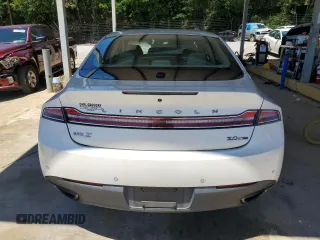 2013 Lincoln MKZ с VIN 3LN6L2G95DR809559, выставлен на аукционе Copart как лот 57581755 с пробегом 64 850 миль миль и Списание • Salvage title. История ставок и продаж доступна на DreamBid. Изображение 6.