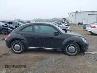 2012 Volkswagen Beetle 2.5L PZEV with VIN 3VWJP7AT0CM628169, listed as a IAAI auction lot 41628754 with 64,770 mi miles. Bid and sale history available at carsss.com. Image 13.