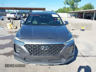 2019 Hyundai Santa Fe SE z VIN 5NMS23AD9KH037539, wystawiony jako IAAI lot #42221894 z przebiegiem 87 755 mil mil oraz . Historia ofert i sprzedaży dostępna na DreamBid. Obrazek 12.