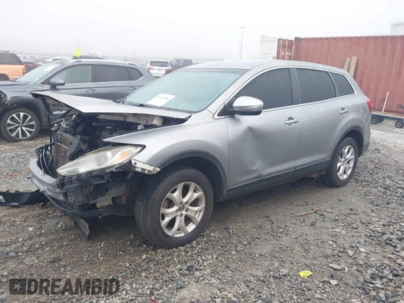 2013 Mazda CX-9 Sport with VIN JM3TB2BA5D0413747, listed as a IAAI auction lot 41107056 with 169,914 mi miles and . Bid and sale history available at carsss.com. Image 2.