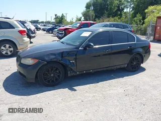 2008 BMW 3 Series 335xi with VIN WBAVD53578A284258, listed as a IAAI auction lot 42050367 with 184,998 mi miles. Bid and sale history available at carsss.com. Image 2.