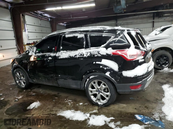2015 Ford Escape Titanium with VIN 1FMCU0J91FUA41653, listed as a Copart auction lot 88871205 with 128,971 mi miles and Salvage Title. Bid and sale history available at DreamBid. Image 2.