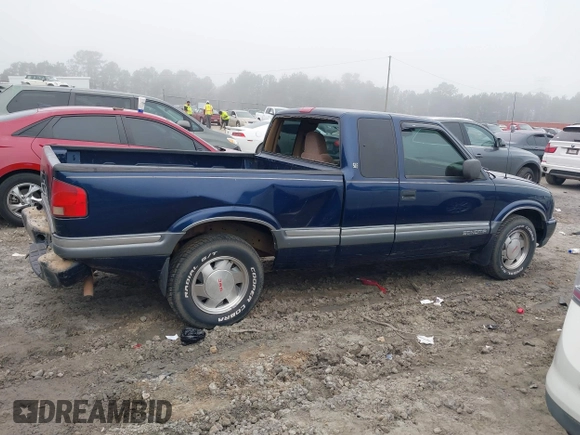 2000 GMC Sonoma SLS z VIN 1GTCS19W9Y8237166, wystawiony jako IAAI lot #41513561 z przebiegiem 177 448 mil mil oraz . Historia ofert i sprzedaży dostępna na DreamBid. Obrazek 14.