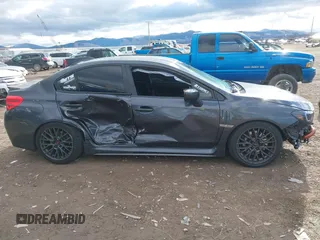 2015 Subaru WRX with VIN JF1VA1A65F9818409, listed as a IAAI auction lot 40895247 with 73,273 mi miles. Bid and sale history available at carsss.com. Image 13.
