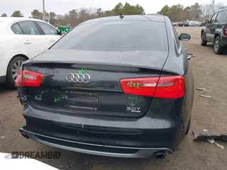2015 Audi A6 Premium Plus z VIN WAUFGAFC6FN043800, wystawiony jako IAAI lot #41702164 z przebiegiem 122 267 mil mil oraz . Historia ofert i sprzedaży dostępna na DreamBid. Obrazek 16.