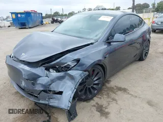 2023 Tesla Model Y Performance z VIN 7SAYGDEF1PF925274, wystawiony jako IAAI lot #42078813 z przebiegiem 20 422 mil mil oraz . Historia ofert i sprzedaży dostępna na DreamBid. Obrazek 2.
