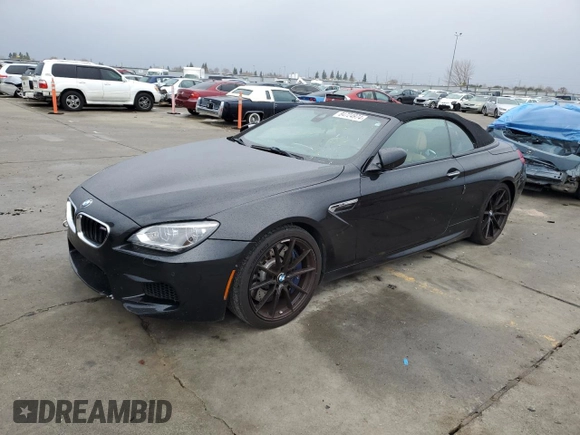 2014 BMW M6 z VIN WBSLZ9C50EDZ78599, wystawiony jako Copart lot #84724974 z przebiegiem 115 051 mil mil oraz Czysty tytuł • Clean title. Historia ofert i sprzedaży dostępna na DreamBid. Obrazek 1.
