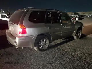 2002 GMC Envoy SLT with VIN 1GKDT13S522286497, listed as a Copart auction lot 84501384 with 207,226 mi miles and Salvage Title. Bid and sale history available at carsss.com. Image 3.