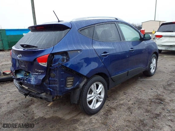 2012 Hyundai Tucson Limited with VIN KM8JU3AC1CU534989, listed as a IAAI auction lot 41513858 with 133,660 mi miles. Bid and sale history available at carsss.com. Image 4.