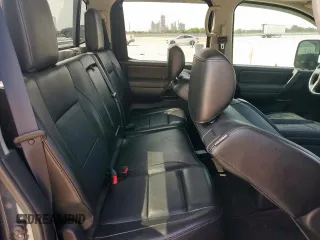 2013 Nissan Titan Pro-4X with VIN 1N6BA0EC3DN310741, listed as a Copart auction lot 57171975 with 146,524 mi miles and Salvage title. Bid and sale history available at DreamBid. Image 10.