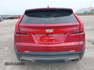 2020 Cadillac XT4 FWD Premium Luxury with VIN 1GYFZCR48LF077119, listed as a IAAI auction lot 40893918 with Not provided miles and . Bid and sale history available at DreamBid. Image 16.