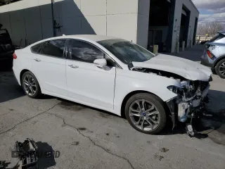 2020 Ford Fusion SEL with VIN 3FA6P0CD1LR177865, listed as a Copart auction lot 43027915 with 103,186 mi miles and Salvage title. Bid and sale history available at DreamBid. Image 4.