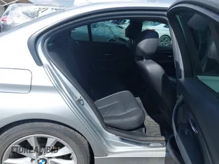 2013 BMW 3 Series 328i xDrive z VIN WBA3B3C55DF541335, wystawiony jako IAAI lot #42606280 z przebiegiem 102 339 mil mil oraz . Historia ofert i sprzedaży dostępna na DreamBid. Obrazek 8.