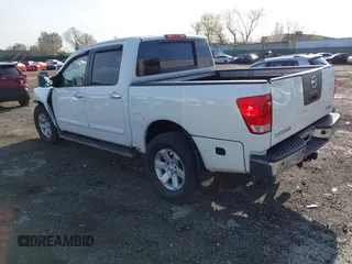 2007 Nissan Titan XE z VIN 1N6AA07B77N244215, wystawiony jako IAAI lot #41880030 z przebiegiem 138 405 mil mil oraz . Historia ofert i sprzedaży dostępna na DreamBid. Obrazek 3.