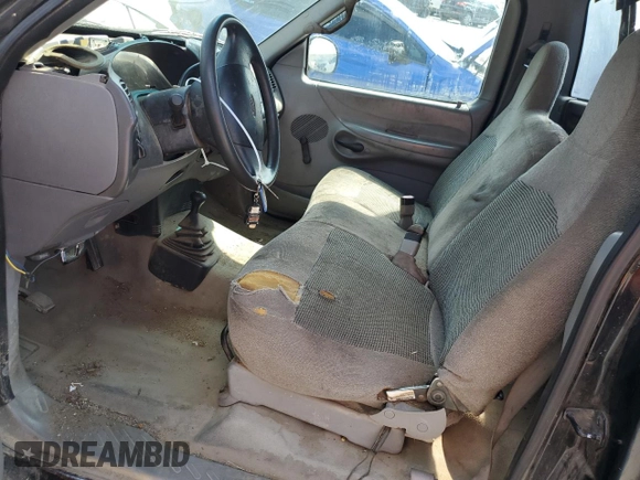 1997 Ford F-150 with VIN 1FTDF1863VKA26554, listed as a Copart auction lot 68837794 with 174,093 mi miles and Clean title. Bid and sale history available at DreamBid. Image 7.