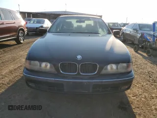 1999 BMW 5 Series 528iA with VIN WBADM634XXGU02243, listed as a Copart auction lot 74981184 with 234,566 mi miles and Salvage Title. Bid and sale history available at carsss.com. Image 5.