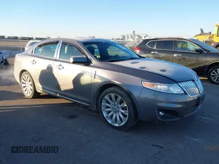 2012 Lincoln MKS with VIN 1LNHL9ER0CG801671, listed as a IAAI auction lot 41287565 with 137,903 mi miles. Bid and sale history available at carsss.com. Image 1.