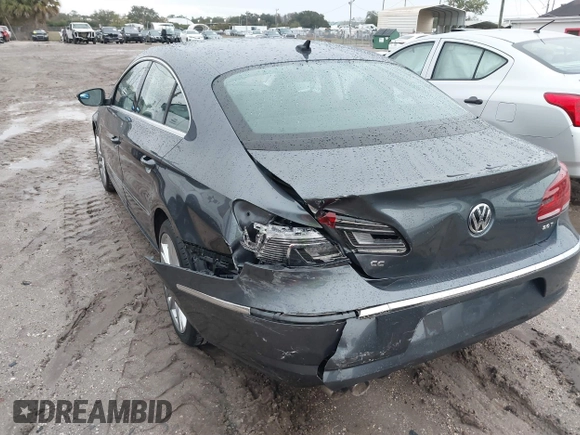 2014 Volkswagen CC Lux with VIN WVWRP7AN6EE520381, listed as a IAAI auction lot 41338169 with 130,363 mi miles. Bid and sale history available at carsss.com. Image 6.