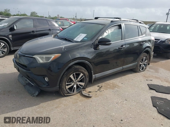 2017 Toyota RAV4 XLE with VIN 2T3WFREVXHW352608, listed as a IAAI auction lot 41921190 with 157,608 mi miles. Bid and sale history available at carsss.com. Image 2.