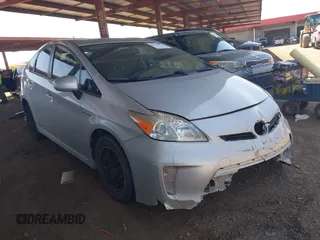 2015 Toyota Prius Four z VIN JTDKN3DU9F1879882, wystawiony jako IAAI lot #42239052 z przebiegiem 239 964 mil mil oraz . Historia ofert i sprzedaży dostępna na DreamBid. Obrazek 1.