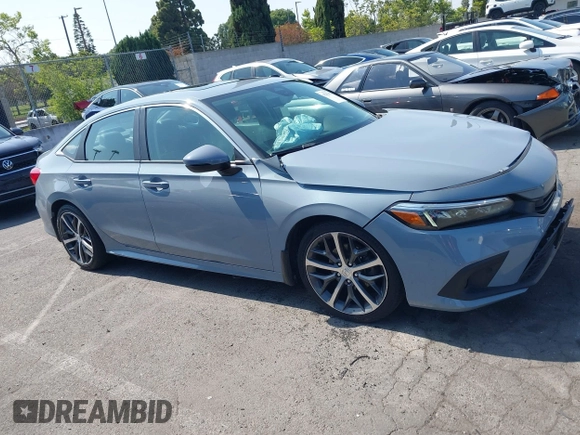 2023 Honda Civic Touring with VIN 2HGFE1F92PH322377, listed as a IAAI auction lot 42361473 with 43,533 mi miles and . Bid and sale history available at DreamBid. Image 12.