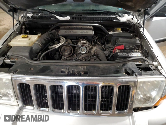 2009 Jeep Commander Sport z VIN 1J8HG48K09C526337, wystawiony jako Copart lot #89026135 z przebiegiem 194 514 mil mil oraz Szkoda całkowita • Salvage title. Historia ofert i sprzedaży dostępna na DreamBid. Obrazek 12.