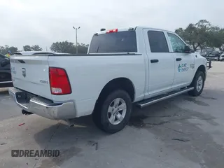 2022 Ram 1500 Tradesman with VIN 3C6RR7KG4NG331979, listed as a IAAI auction lot 41447852 with 14,201 mi miles and . Bid and sale history available at DreamBid. Image 4.