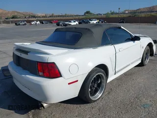 2000 Ford Mustang with VIN 1FAFP4441YF251618, listed as a IAAI auction lot 42439813 with 197,178 mi miles and . Bid and sale history available at DreamBid. Image 4.