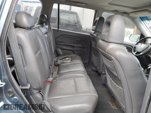 2005 Honda Pilot EX-L z VIN 5FNYF18585B061659, wystawiony jako Copart lot #54946735 z przebiegiem 263 582 mil mil oraz Szkoda całkowita • Salvage title. Historia ofert i sprzedaży dostępna na DreamBid. Obrazek 11.