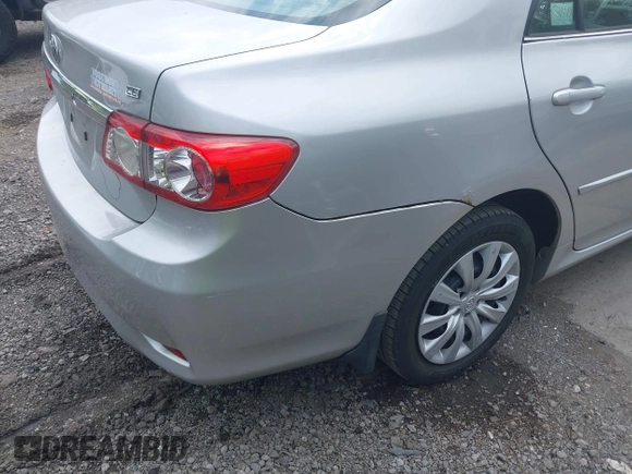 2013 Toyota Corolla L with VIN 2T1BU4EEXDC052854, listed as a IAAI auction lot 42230118 with 156,120 mi miles and . Bid and sale history available at DreamBid. Image 6.