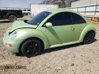 2004 Volkswagen New Beetle Coupe GL with VIN 3VWBK31C74M412879, listed as a Copart auction lot 50596255 with 192,058 mi miles and Salvage Title. Bid and sale history available at carsss.com. Image 1.