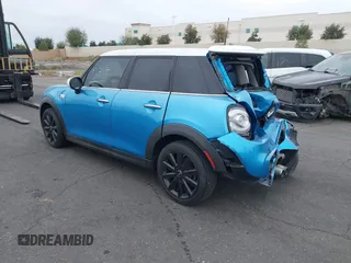 2015 MINI Hardtop 4 Door S with VIN WMWXU3C58F2B58305, listed as a IAAI auction lot 41413715 with 98,413 mi miles and . Bid and sale history available at DreamBid. Image 3.