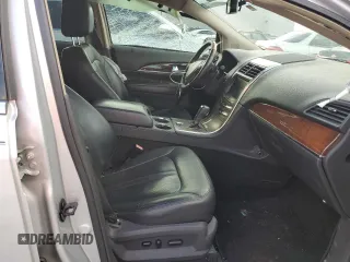 2015 Lincoln MKX with VIN 2LMDJ6JK8FBL28436, listed as a Copart auction lot 47573005 with 129,147 mi miles and Salvage Title. Bid and sale history available at carsss.com. Image 7.