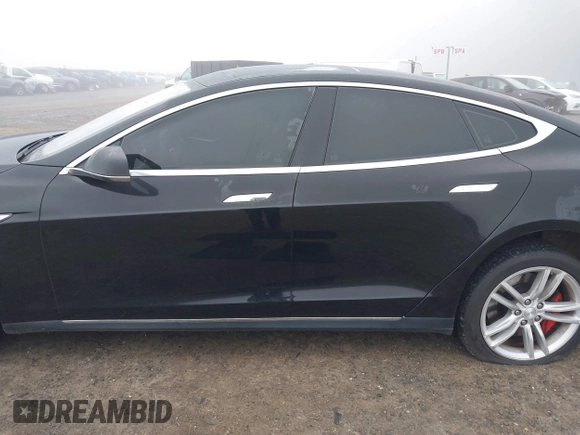 2014 Tesla Model S 60 with VIN 5YJSA1H1XEFP36008, listed as a IAAI auction lot 41287240 with 48,171 mi miles and . Bid and sale history available at DreamBid. Image 15.