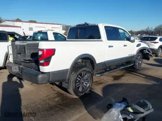 2023 Nissan Titan XD PRO-4X with VIN 1N6AA1FB2PN111269, listed as a IAAI auction lot 41253693 with 9,929 mi miles. Bid and sale history available at carsss.com. Image 4.