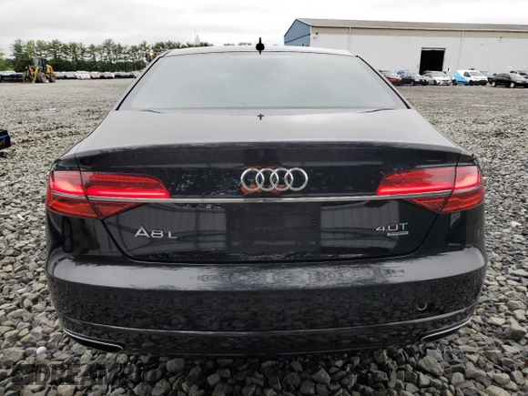 2016 Audi A8 Sport z VIN WAU43AFD2GN005719, wystawiony jako Copart lot #60746275 z przebiegiem 125 802 mil mil oraz Szkoda całkowita • Salvage title. Historia ofert i sprzedaży dostępna na DreamBid. Obrazek 6.