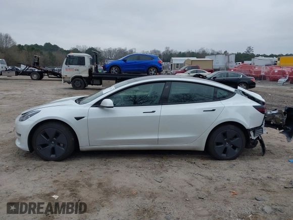 2023 Tesla Model 3 Long Range with VIN 5YJ3E1EB9PF393622, listed as a IAAI auction lot 41207132 with 14,097 mi miles and . Bid and sale history available at DreamBid. Image 14.