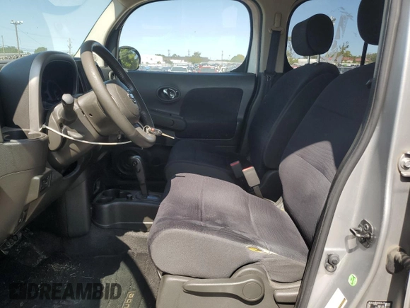 2010 Nissan Cube S z VIN JN8AZ2KR2AT159303, wystawiony jako Copart lot #70977764 z przebiegiem 96 670 mil mil oraz Nie do naprawy • Non repairable. Historia ofert i sprzedaży dostępna na DreamBid. Obrazek 7.