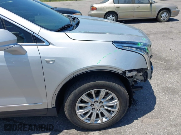 2019 Cadillac XT5 FWD with VIN 1GYKNARS4KZ259863, listed as a IAAI auction lot 42603196 with 51,251 mi miles and . Bid and sale history available at DreamBid. Image 18.