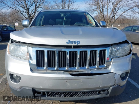 2011 Jeep Grand Cherokee Laredo z VIN 1J4RR4GG2BC511289, wystawiony jako IAAI lot #41240075 z przebiegiem 88 140 mil mil oraz . Historia ofert i sprzedaży dostępna na DreamBid. Obrazek 12.